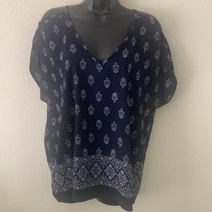 The outfit Blue & white print cold shoulder V-neck & back top size M Crepe